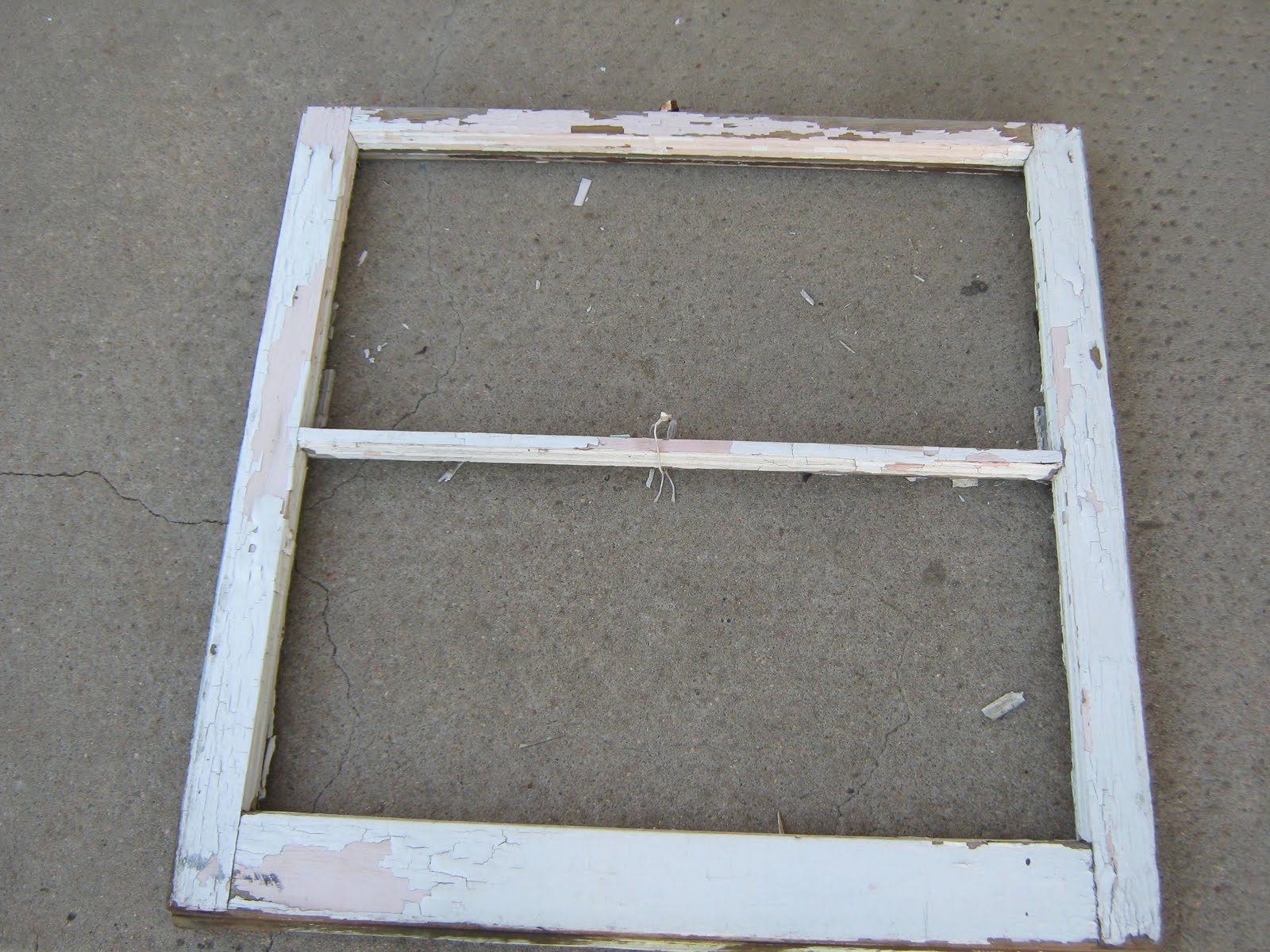 Vintage Window with peeling white paint