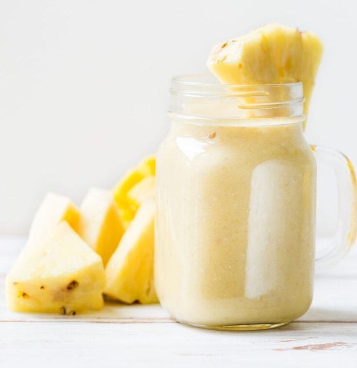 PINA COLADA SMOOTHIE with pineapple wedge