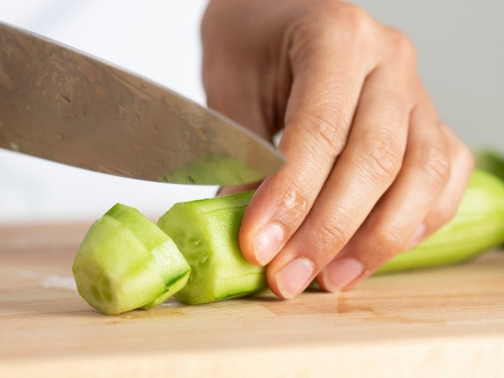 chopping cucumber